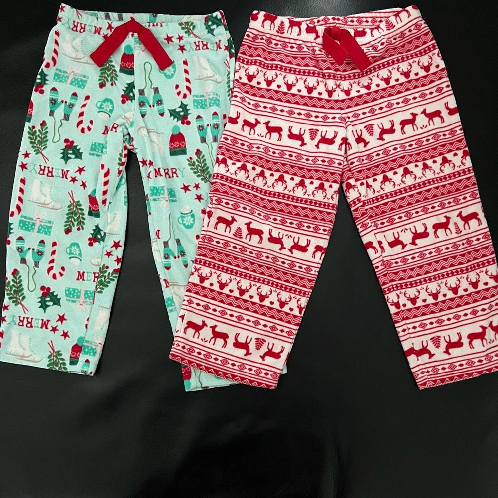 2 Cozy Carter’s Holiday Pajamas